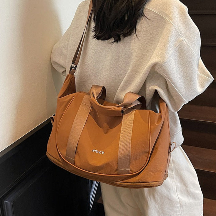 Bolso de mano deportivo para mujer de tejido resistente - Vestiria