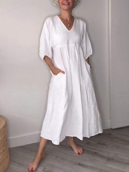 Vestido Midi Elegante con Bolsillos y Corte Suave