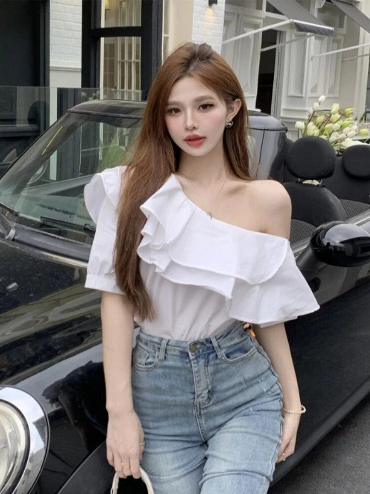 Blusa de moda con un hombro descubierto