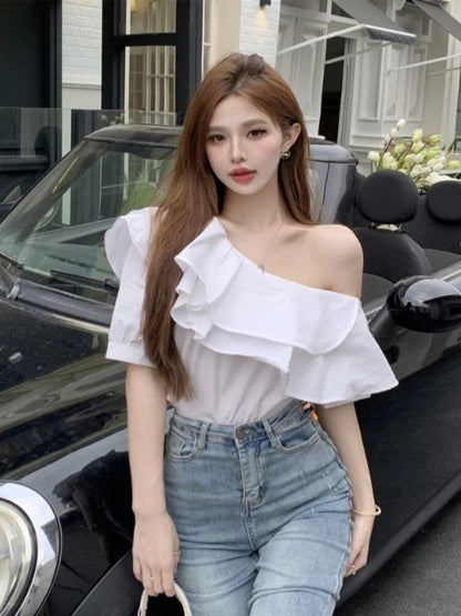 Blusa de moda con un hombro descubierto