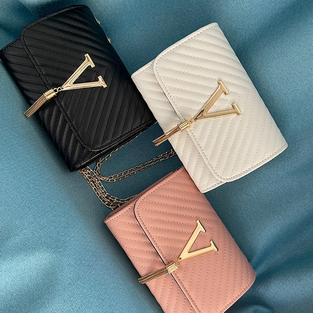 Bolso de mano elegante con borla de moda - Vestiria