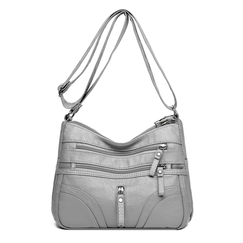 Bolso bandolera elegante con cremallera y detalles femeninos