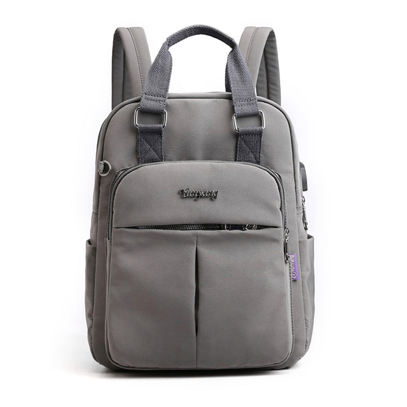 Mochila de agua resistente con puerto USB