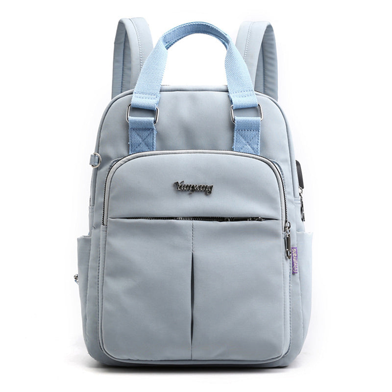 Mochila de agua resistente con puerto USB